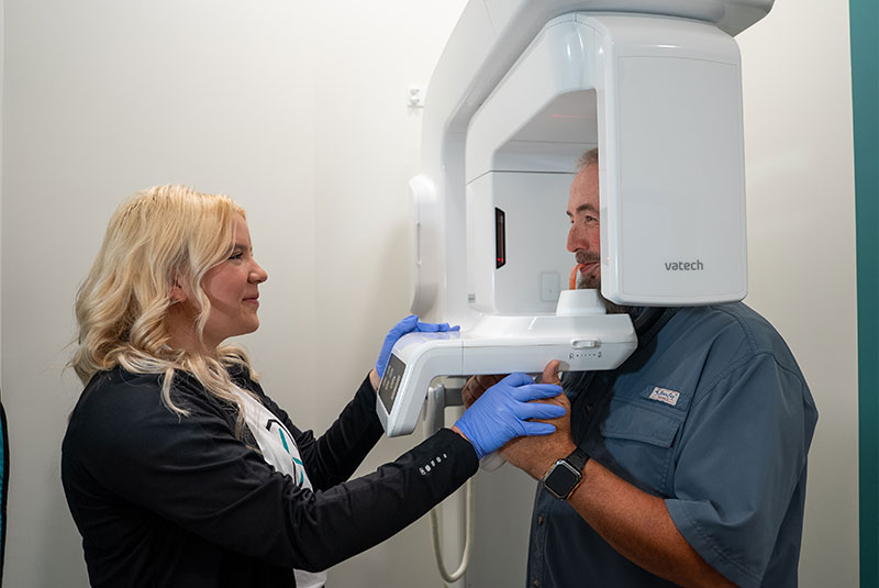 Paitent taking a dental x-ray
