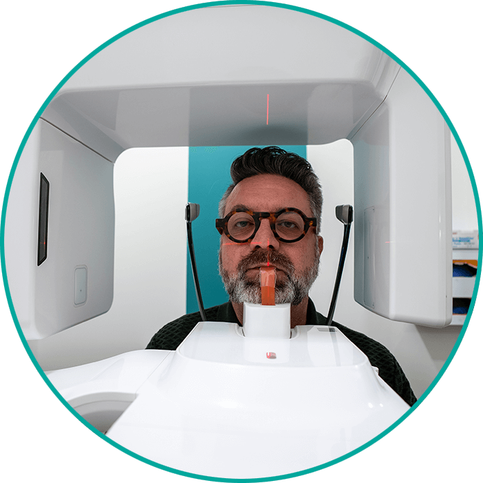 Paitent taking a dental x-ray